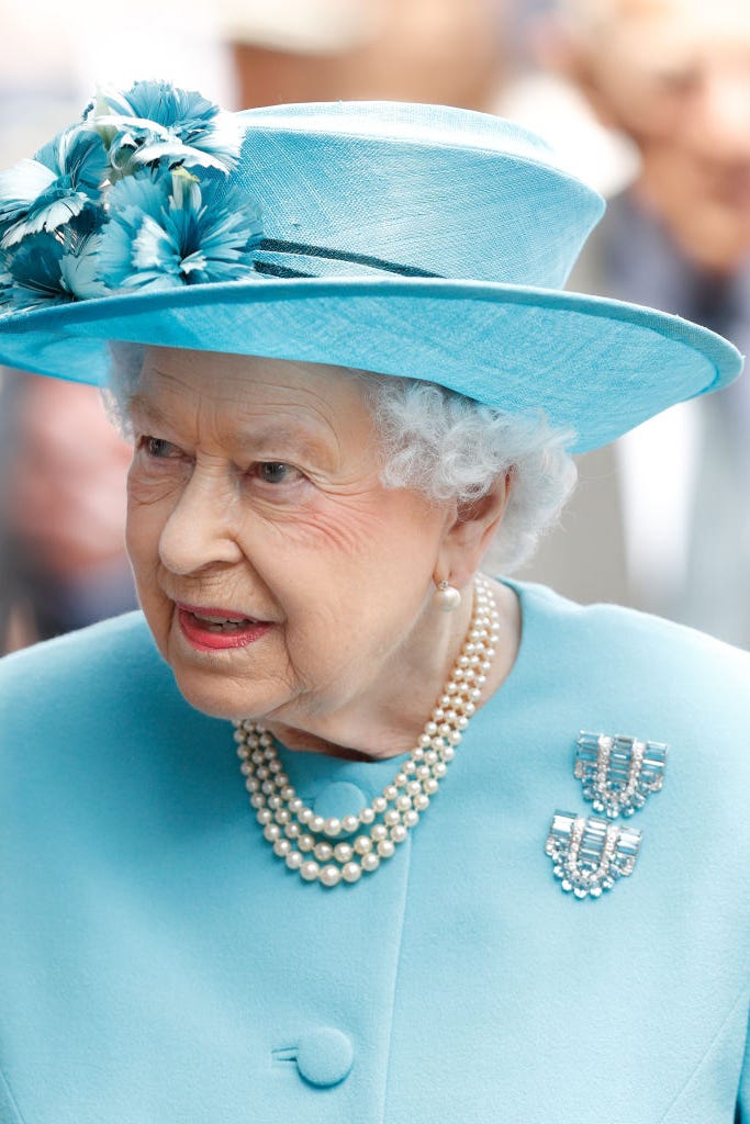 Turquoise, Fashion accessory, Hat, Turquoise, Headgear, Smile, Costume hat, Tradition, Jewellery, 