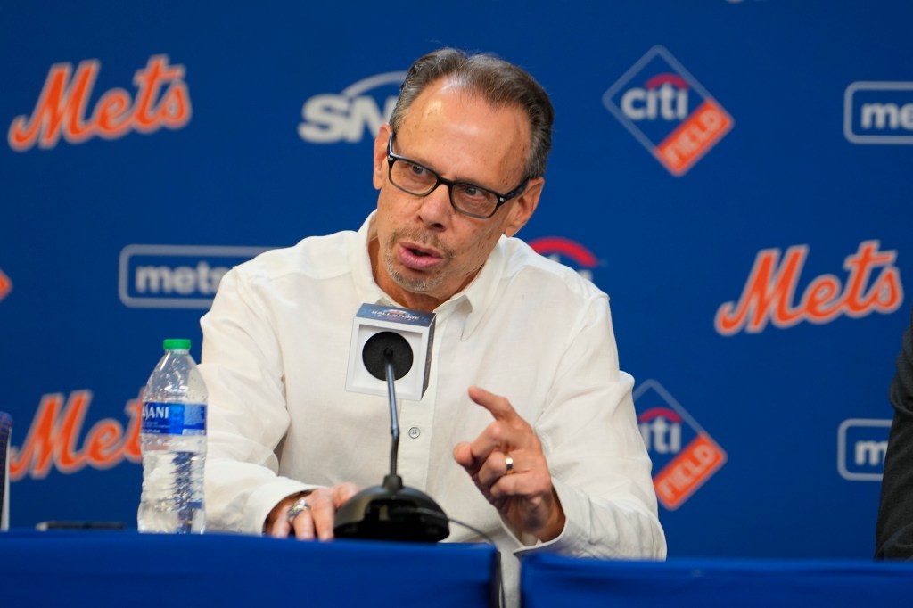 New York Mets general manager Billy Eppler speaking at a press conference.