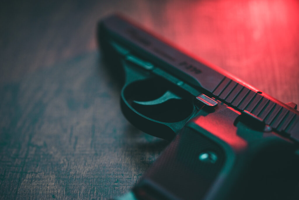 Red lighting hand gun