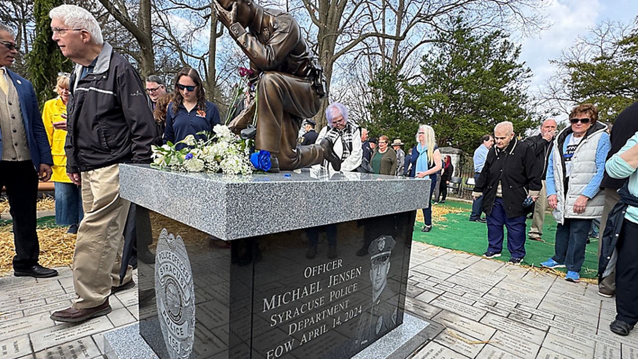 The Tipp Hill community erected a statue commemorating two Central NY police officers killed in action in 2024. (Spectrum News 1/Lacey Leonardi)