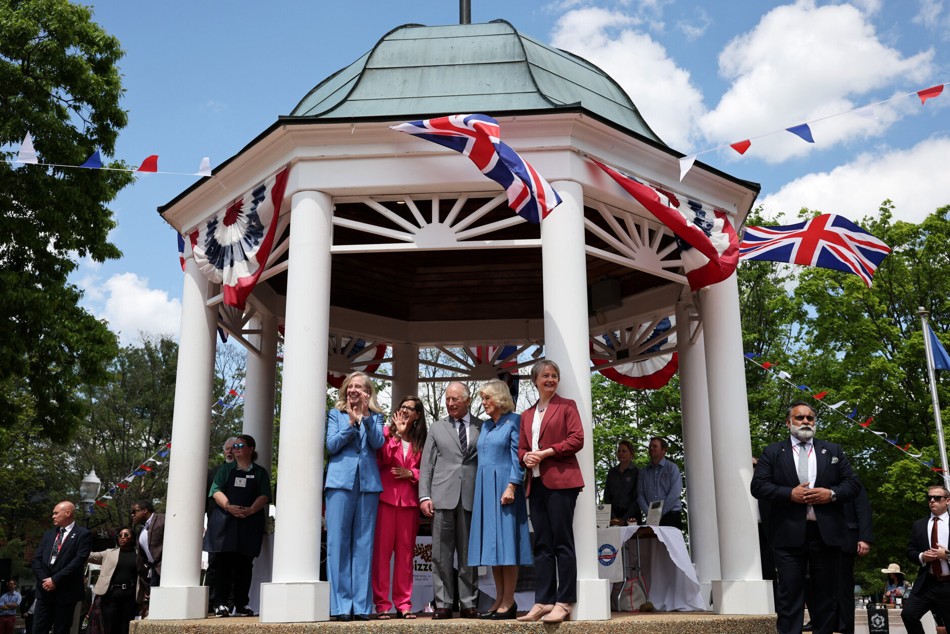 Left to right; Virginia Gov. Abigail Spanberger, Front Royal Mayor Lori A. Cockrell, Britain's King Charles III, Queen Camilla, and Secretary of State for Foreign and Commonwealth Affairs of the United Kingdom Yvette Cooper attend a parade and block party event Thursday, April 30, 2026, in Front Royal, Va. (Win McNamee/Pool Photo via AP)