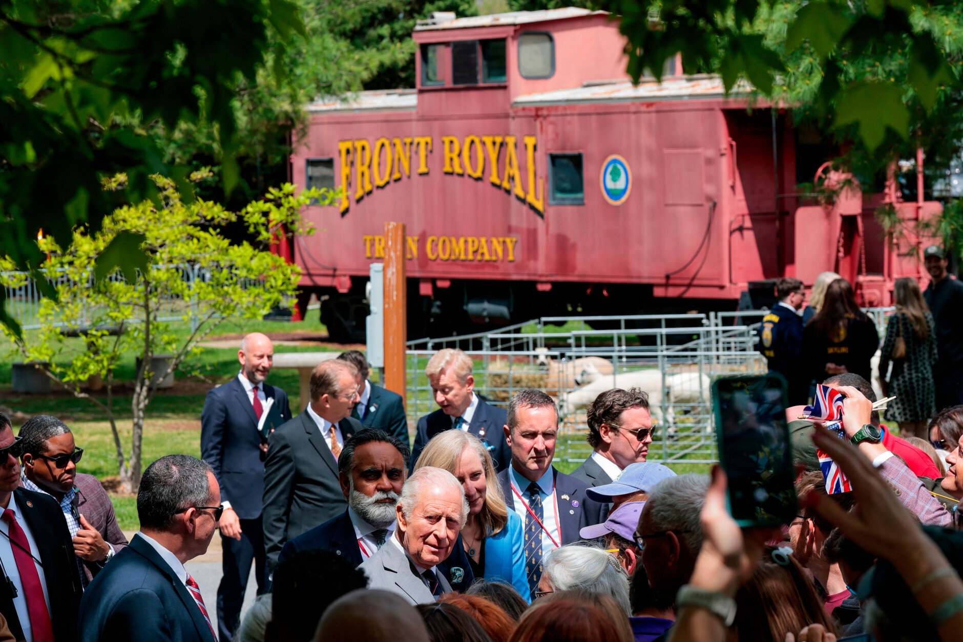 Britain's King Charles walks among community members during a block party in Front Royal, Va., Thursday, April 30, 2026. (Kylie Cooper/Pool Photo via AP)