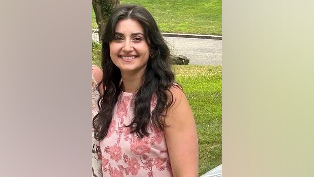 Brittany Kritis-Garip standing and looking at the camera