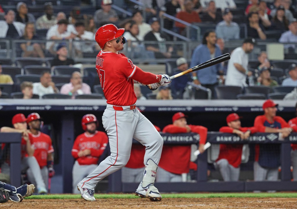 Los Angeles Angels right fielder Mike Trout hitting a three-run homer.