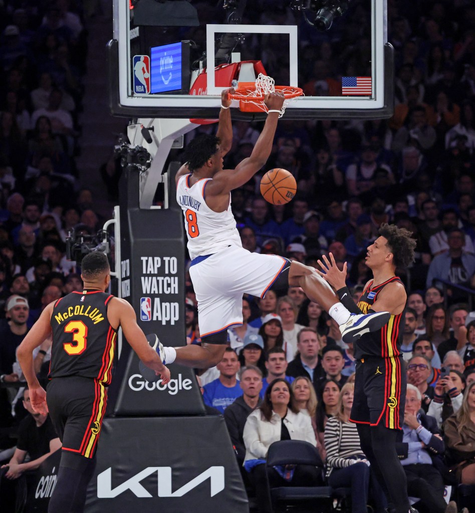 Og Anunoby #8 slams the ball during the second quarter.
