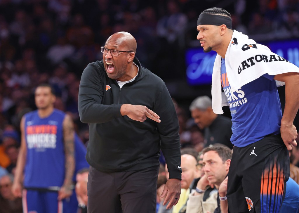 New York Knicks head coach Mike Brown reacting intensely during a game.