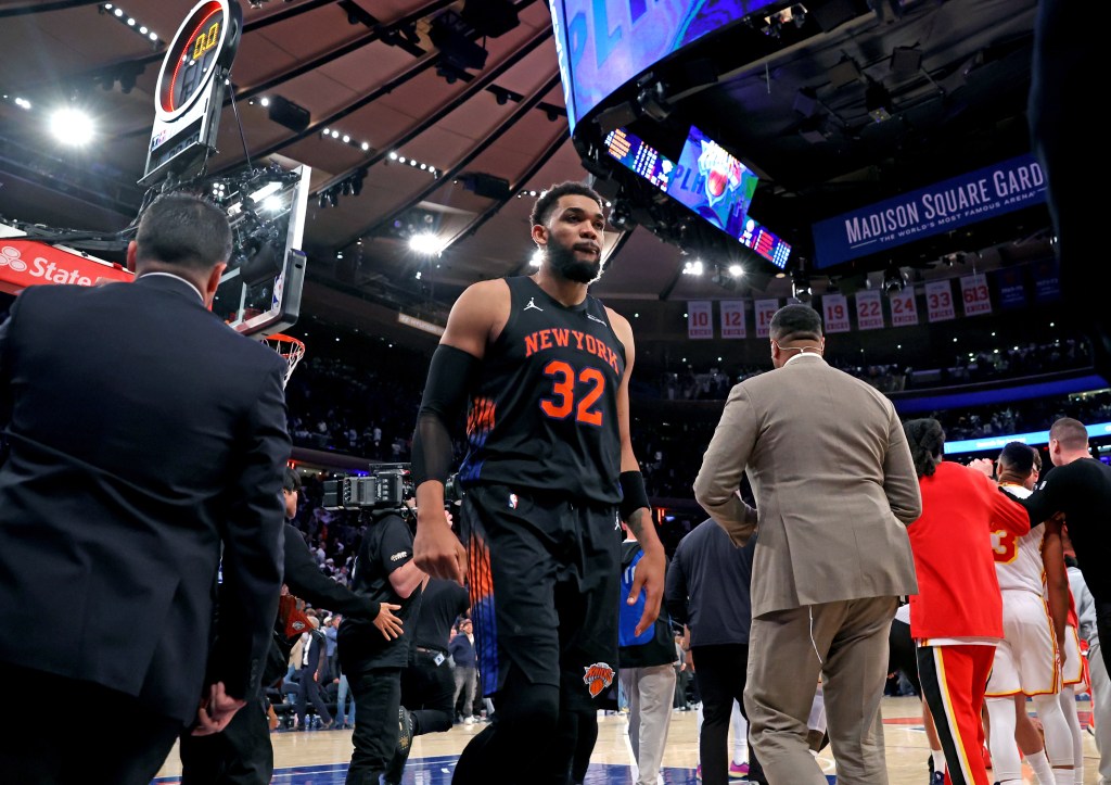 New York Knicks center Karl-Anthony Towns #32 walks off the court at the end of the fourth quarter.