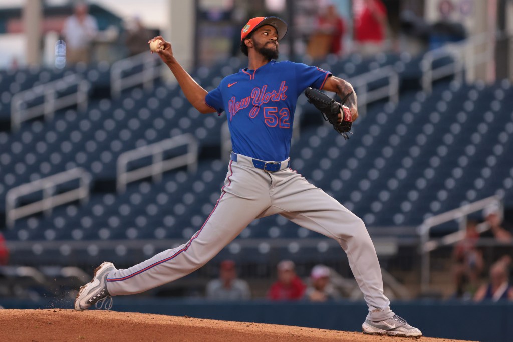 New York Mets pitcher Carl Edwards Jr. delivering a pitch.