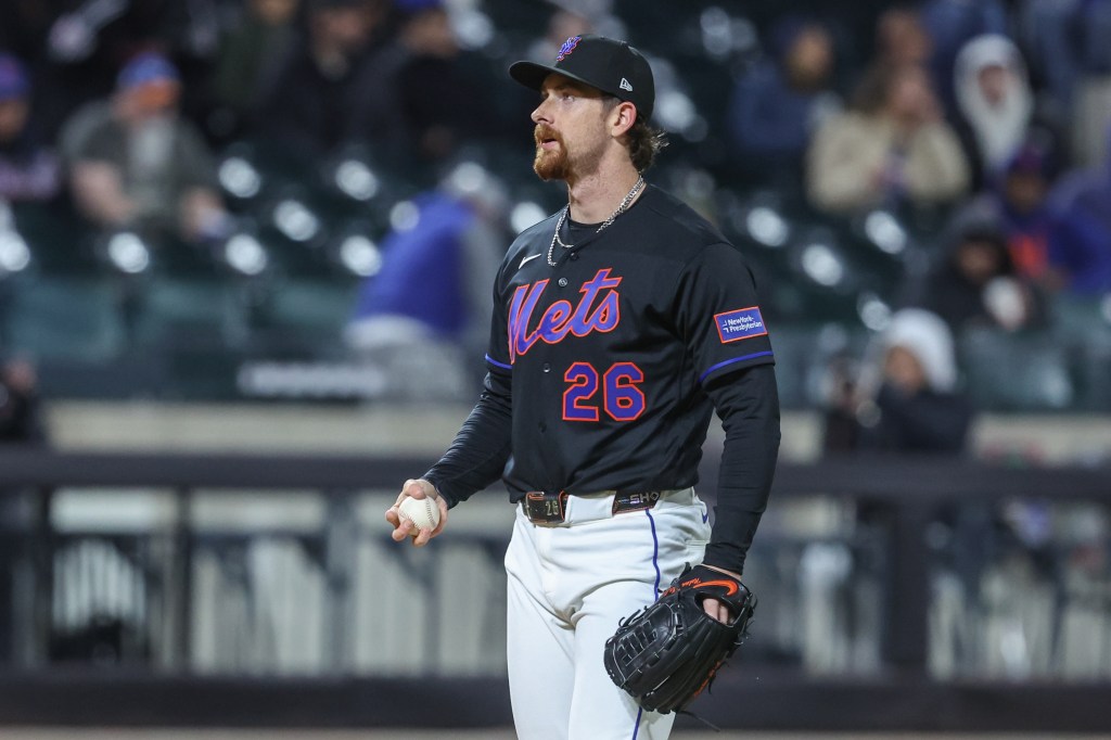 New York Mets starting pitcher Nolan McLean reacts after giving up a two-run home run.