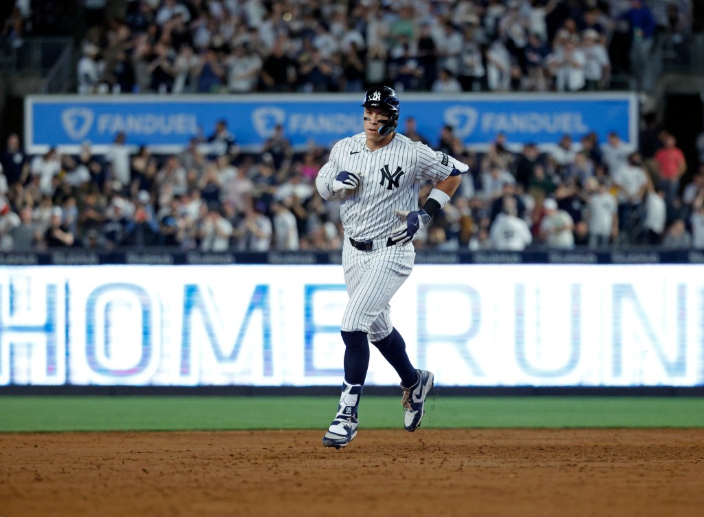 Aaron Judge rounds the bases after his solo home run against the Los Angeles Angels in the sixth inning at Yankee Stadium in The Bronx, New York, USA, Monday, April 13, 2026. 