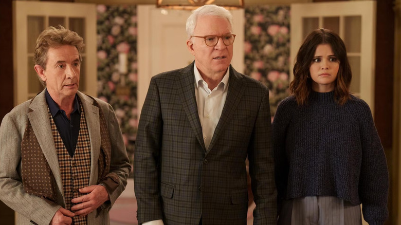 Oliver, Charles, and Mabel looking scared in Only Murders in the Building