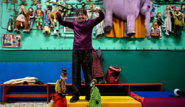 a puppeteer with puppets