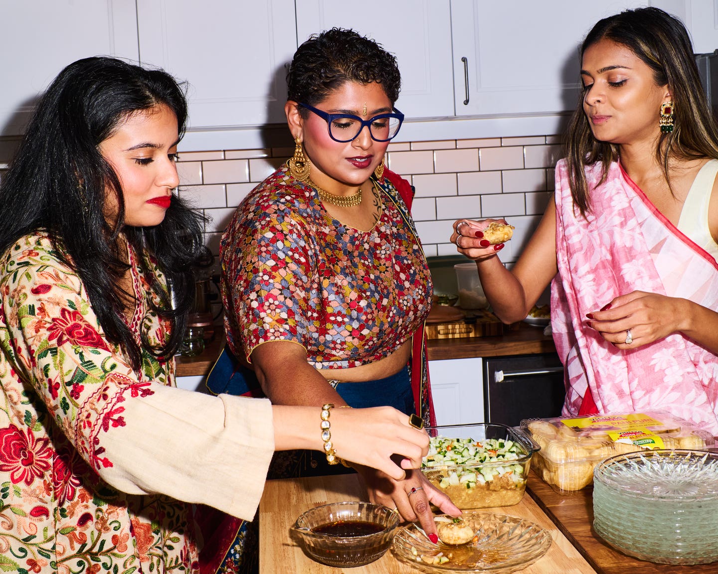 Anikah Shaokat and guests in the kitchen for Bengali New Year