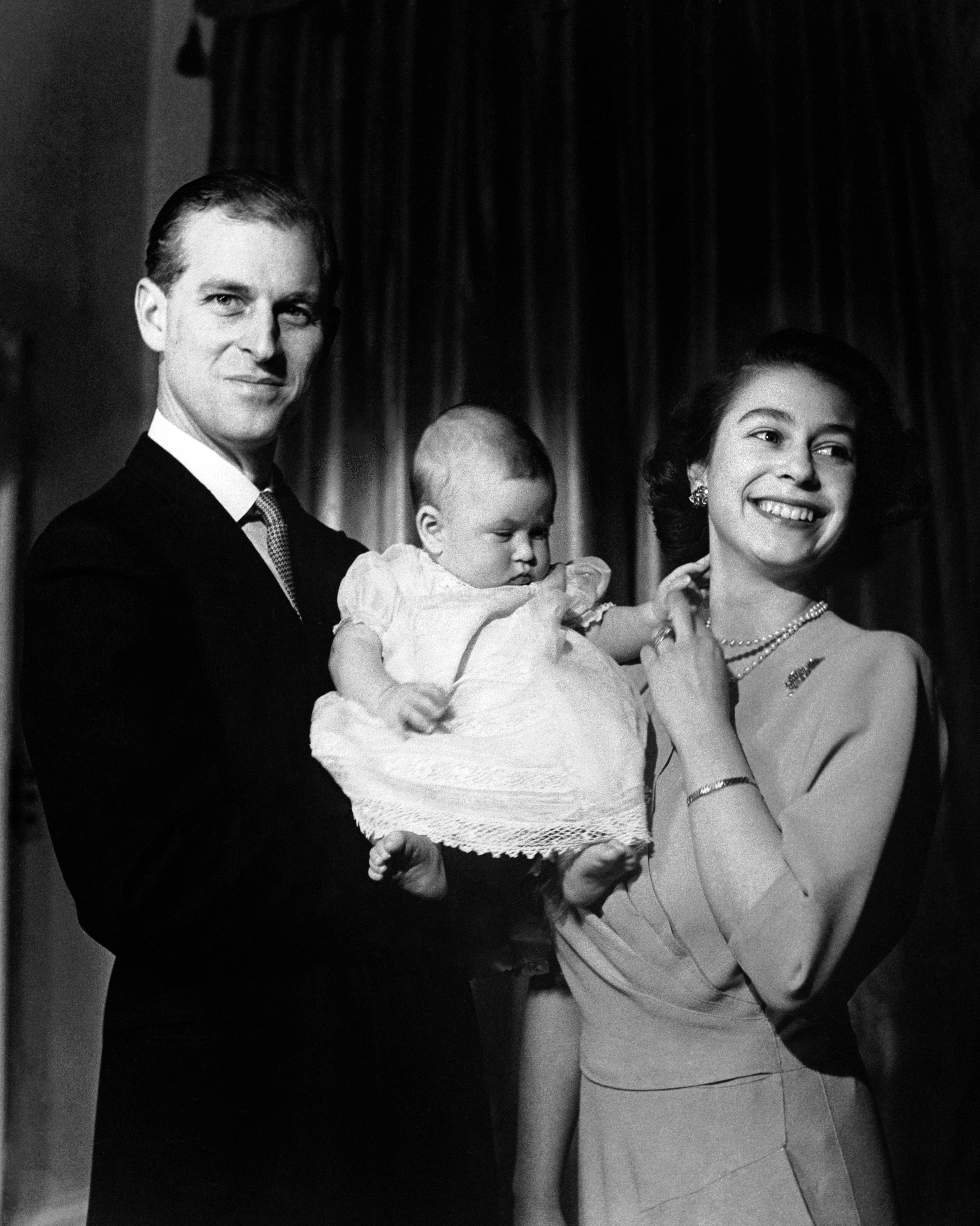 Royalty - Princess Elizabeth and Duke of Edinburgh with Prince Charles - Buckingham Palace, London