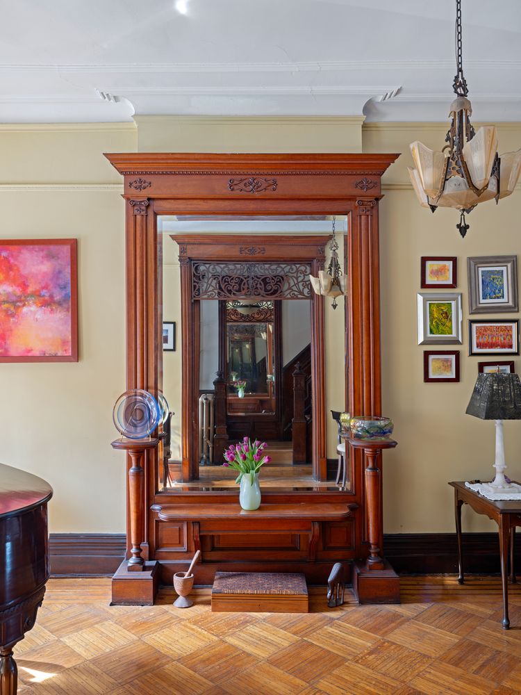 large mirror in the front entry hall