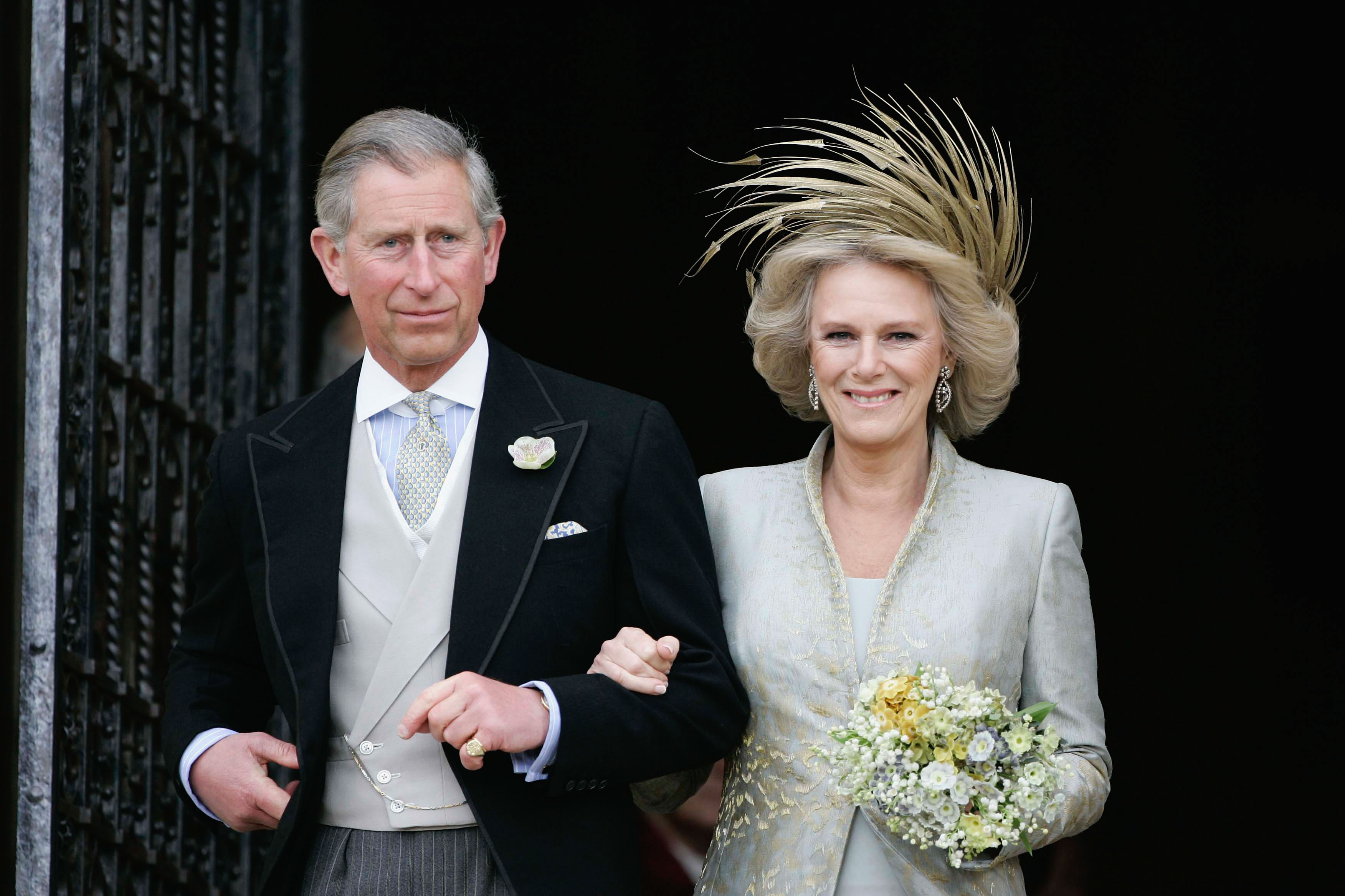 Queen Camilla and King Charles smiling on their wedding day