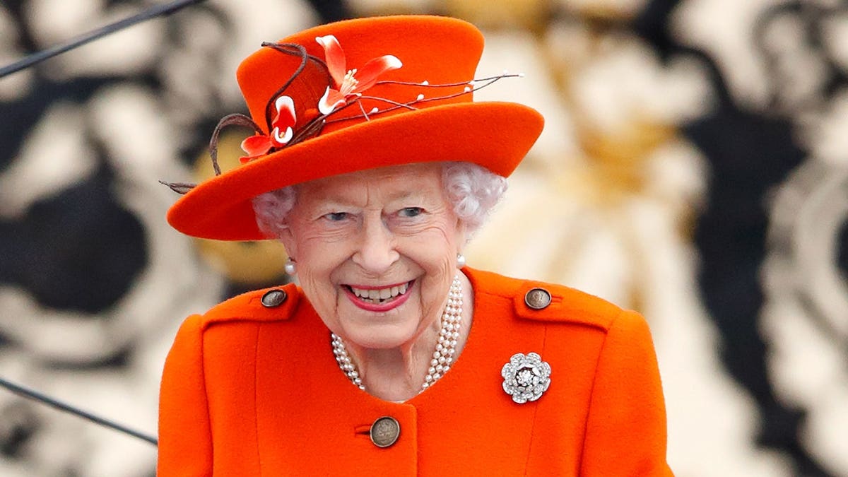 Queen Elizabeth II wearing diamond rose brooch at Buckingham Palace launch event