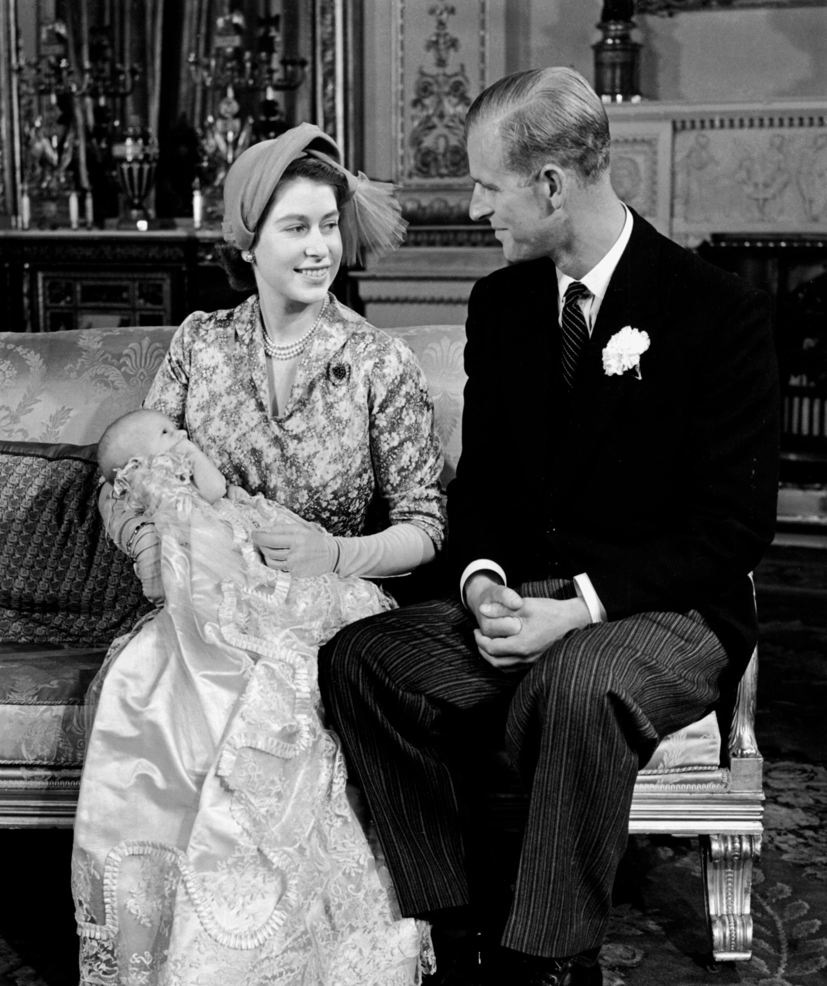 Queen Elizabeth II and Prince Philip, Duke of Edinburgh, with their daughter Princess Anne after her christening ceremon