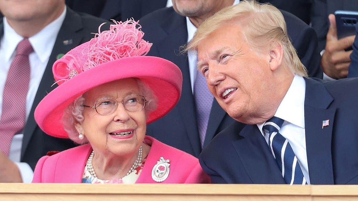 Queen Elizabeth II and President Donald Trump standing together at D-Day 75 commemoration in Portsmouth England