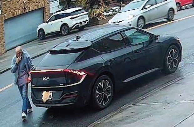 Shortly after the robbery, Vincenzo Randazzo was captured by surveillance cameras exiting his car and removing an object that he placed over his vehicle's rear license plate to conceal his involvement in the robbery. (EDNY)