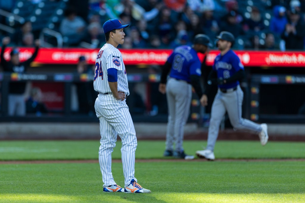 New York Mets pitcher Kodai Senga reacts on the mound after giving up a home run.