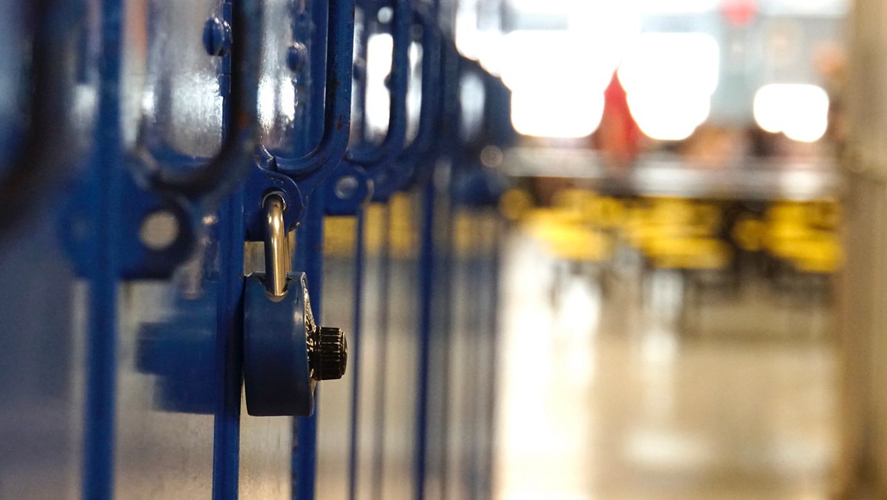school lockers, one with a lock on it