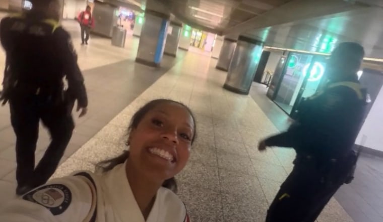 Sheinelle Jones took a selfie with the police officers who rescuted her from the train.