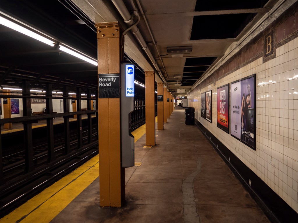 The complete stranger punched the victim repeatedly on the southbound No. 2 train platform of the station at Beverley Road and Nostrand Avenue, cops said.