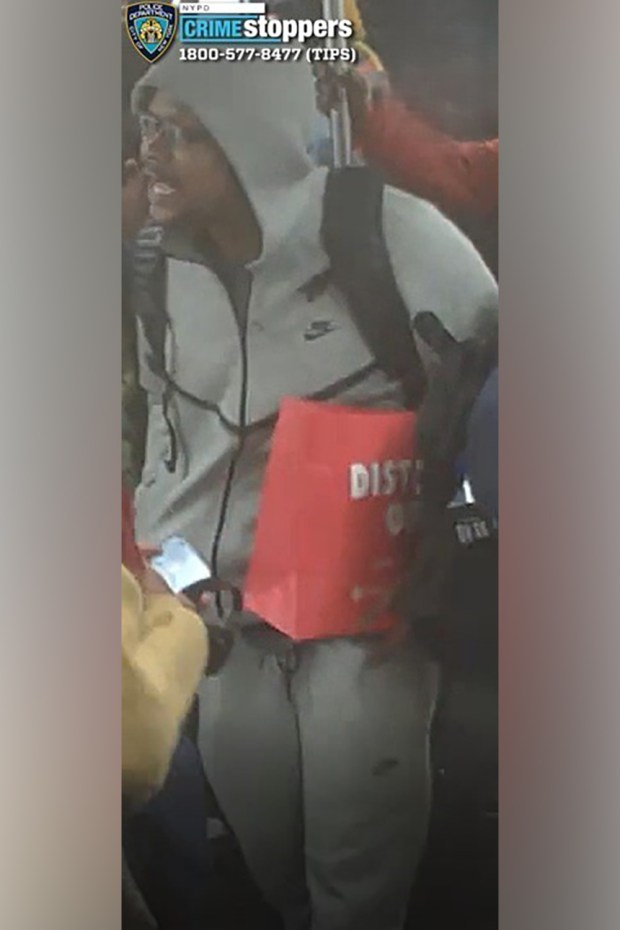 Police released images of a man who they said slashed a 26-year-old man in the face whil they were on a No. 4 train in Manhattan. (NYPD)