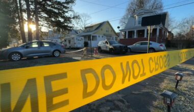crime scene tape outside a residential area