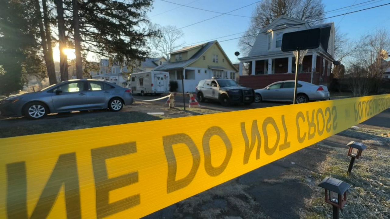 crime scene tape outside a residential area