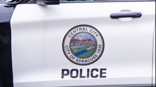 driver's side door of syracuse police car