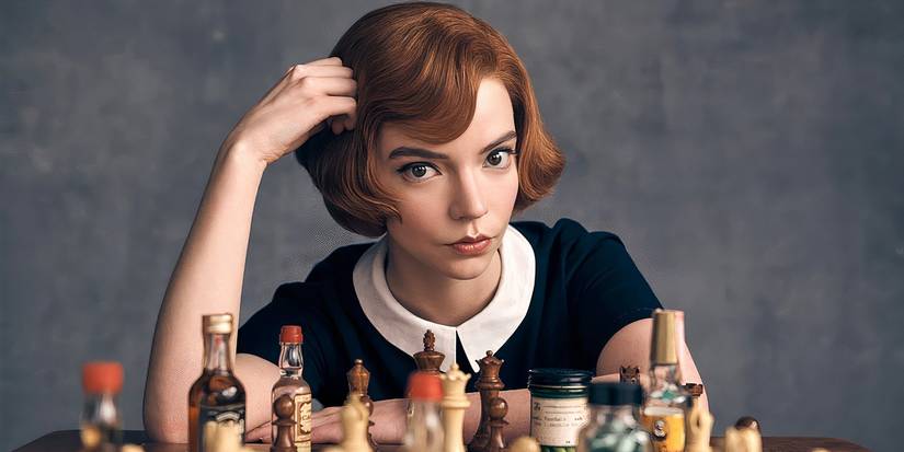 Anya Taylor-Joy sits in front of a chess board