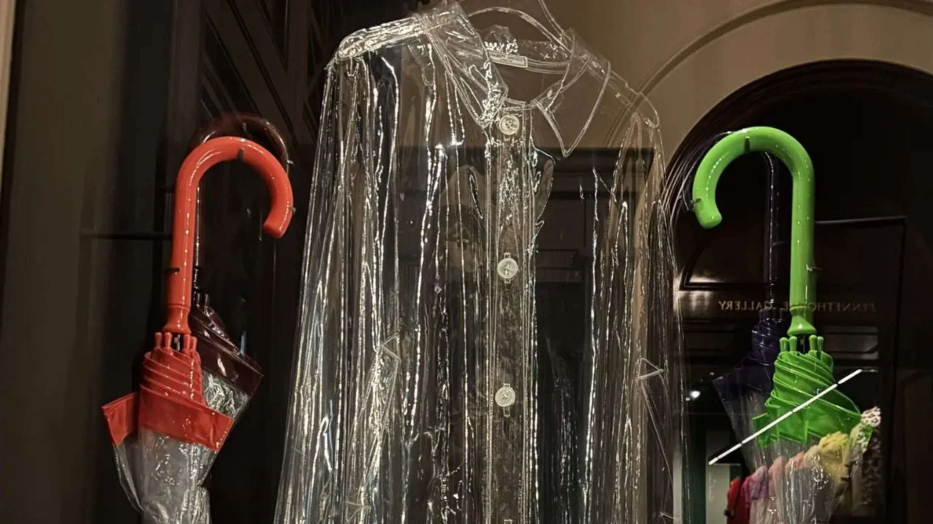 The transparent coat allowed people to still see her outfits in all weathers. The transparent coat allowed people to still see her outfits in all weathers. <br>