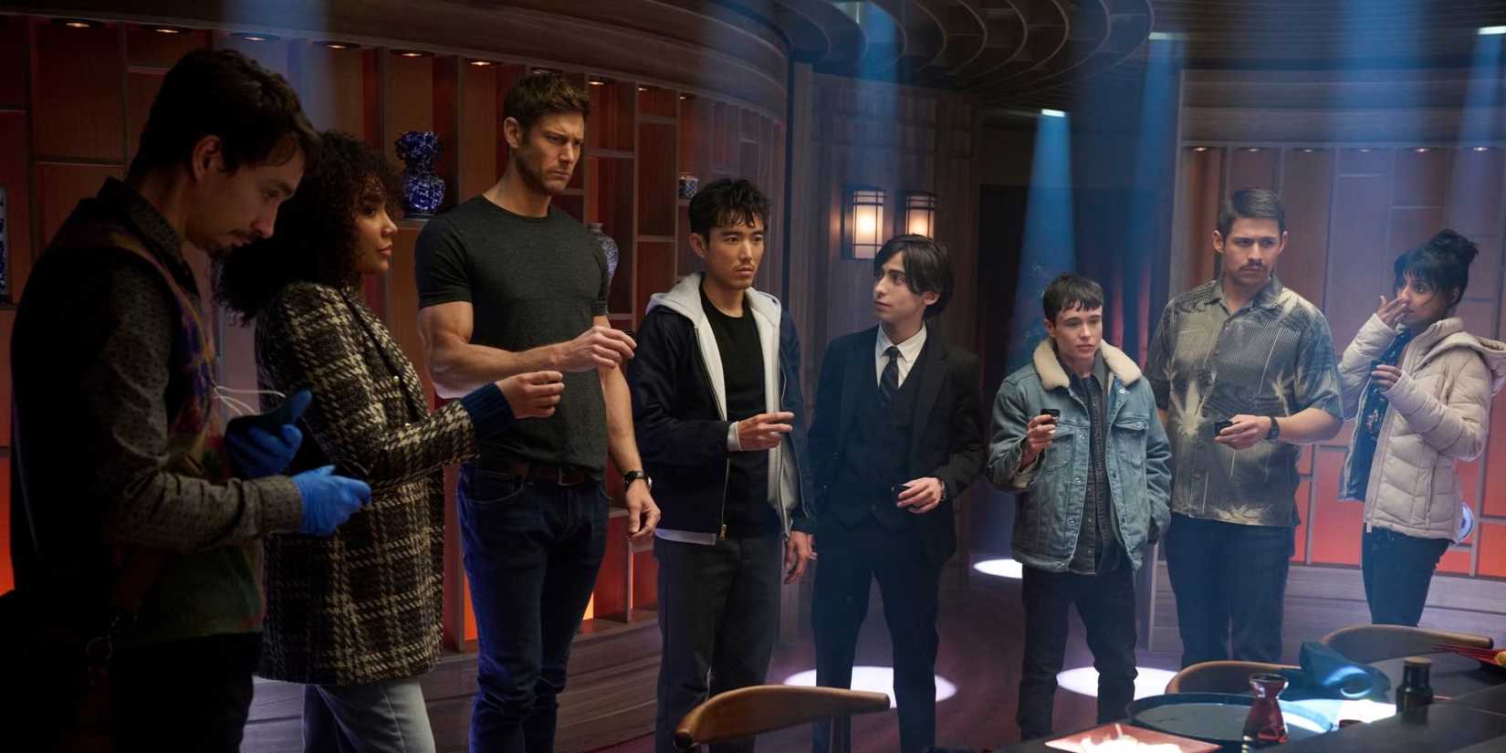 Emmy Raver-Lampman, Tom Hopper, Elliot Page and the cast holding shot glasses in The Umbrella Academy.