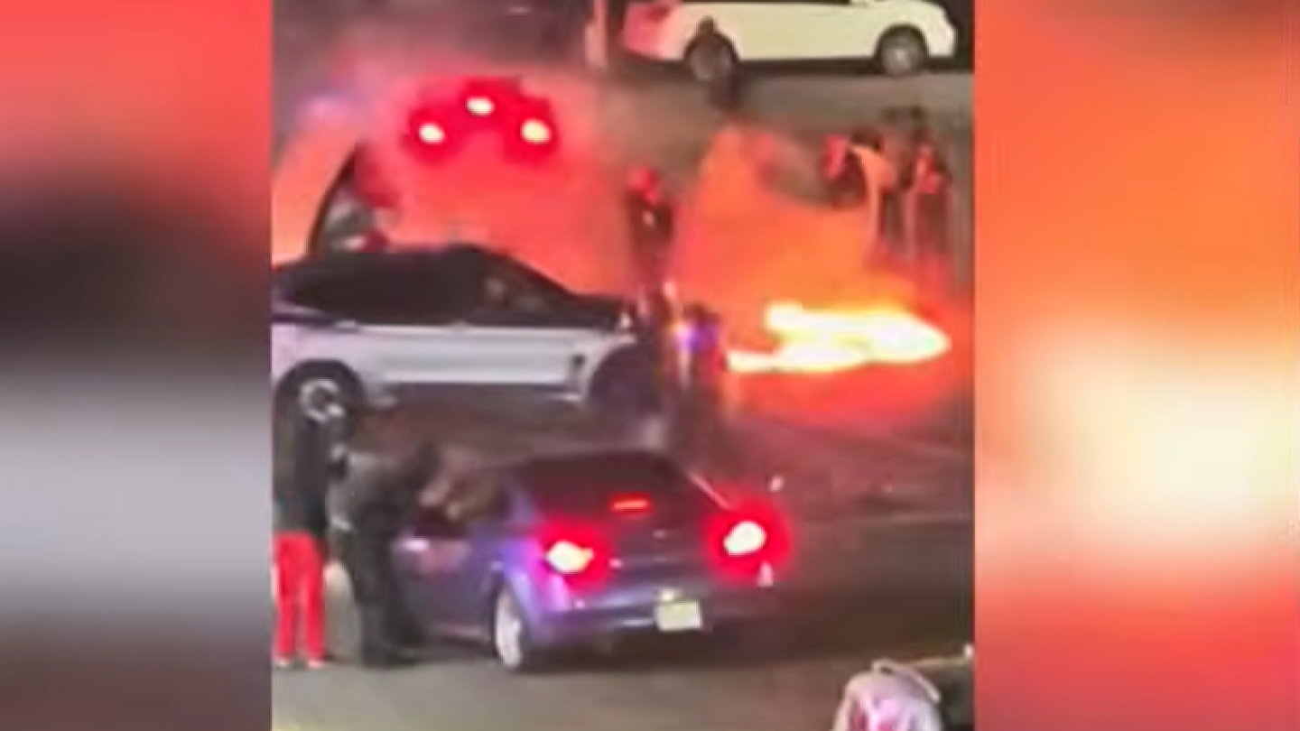 NYPD responds to Queens street takeover, group jumps on cruiser to break windshield