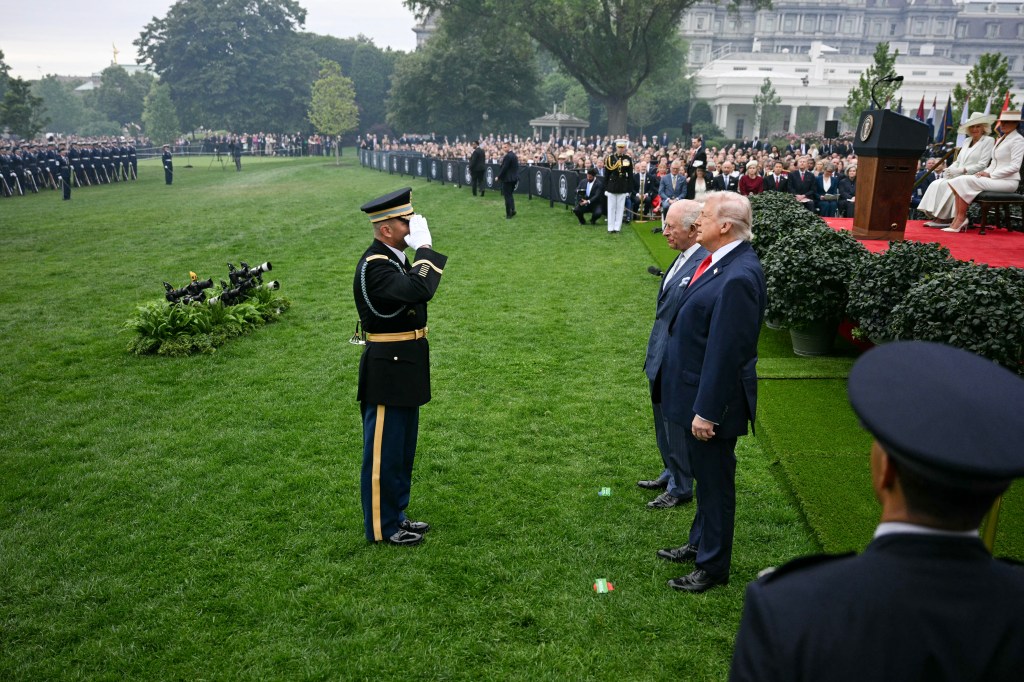President Donald Trump and King Charles III review the troops.