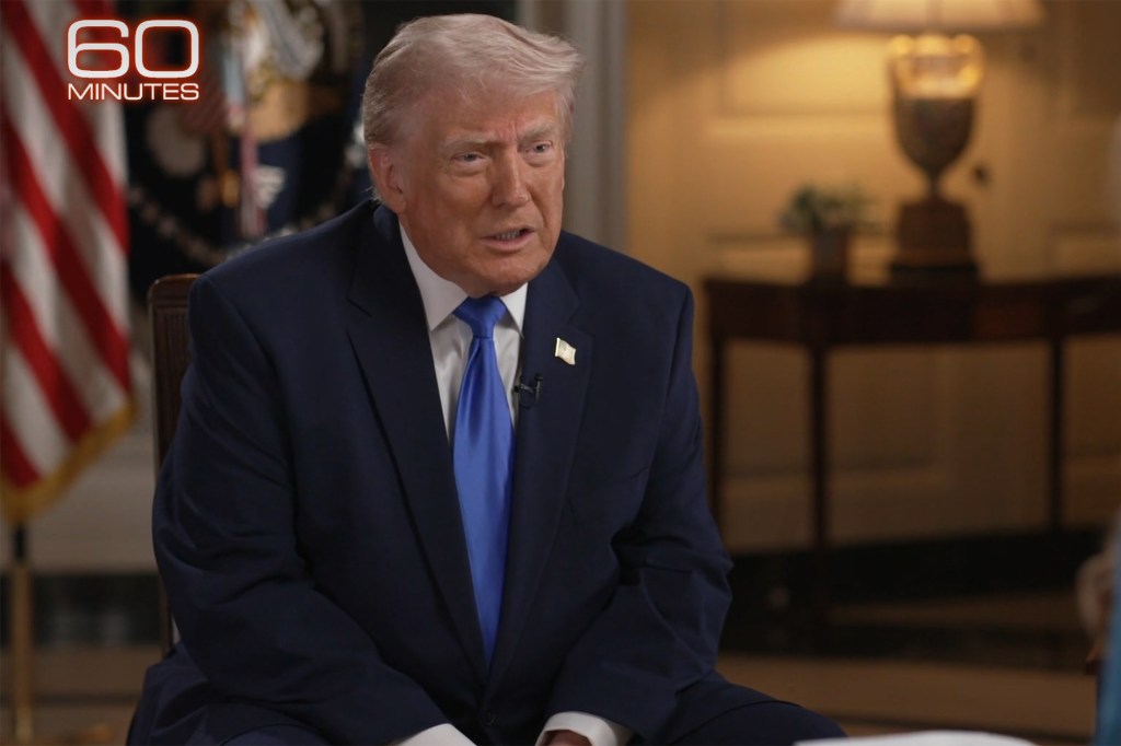 Donald Trump in a dark suit and blue tie during a "60 Minutes" interview.