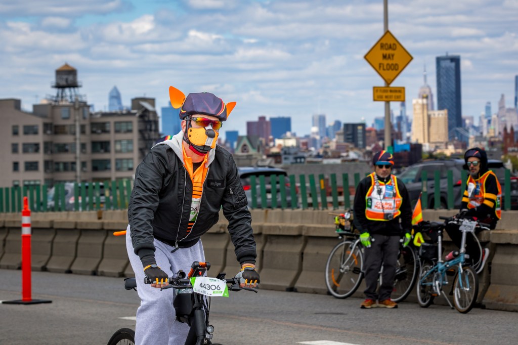 A Cyclist wearing a dog mask in the Annual Five Boro Bike Tour on May 3, 2026 in New York City.