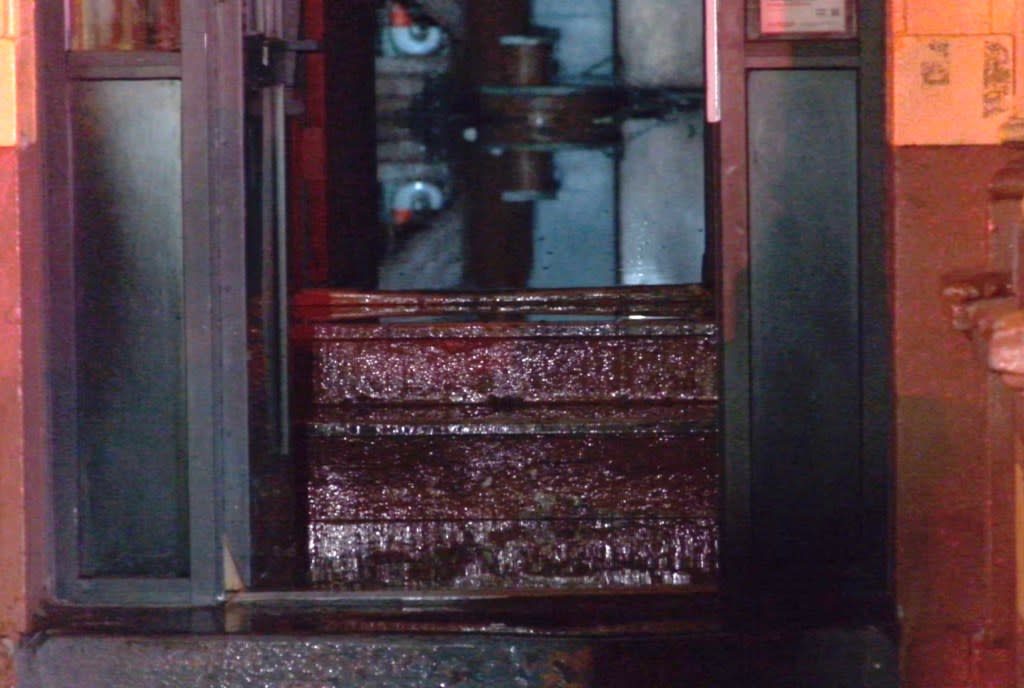 A burned door at a building in Inwood that went up in flames on Monday, May 4, 2026. FNTV