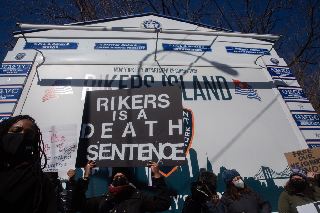 Criminal justice reform advocates protest against detained people dying on Rikers Island Island,
