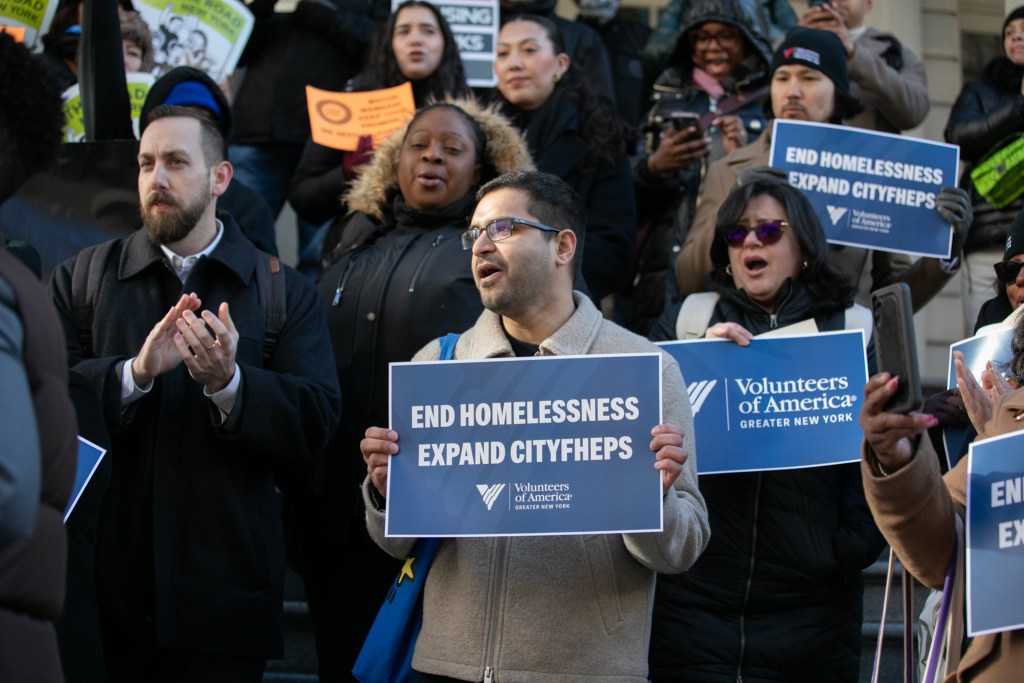 Anti-homelessness advocates rally at City Hall in favor of funding for the CityFHEPS rental voucher program,