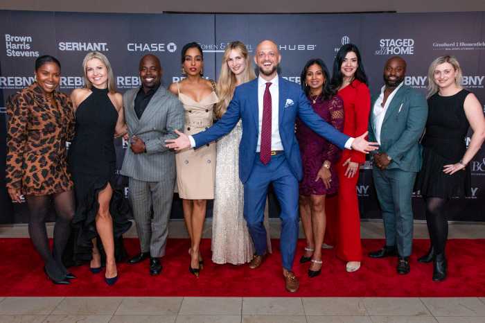 group of people dressed up at an awards ceremony