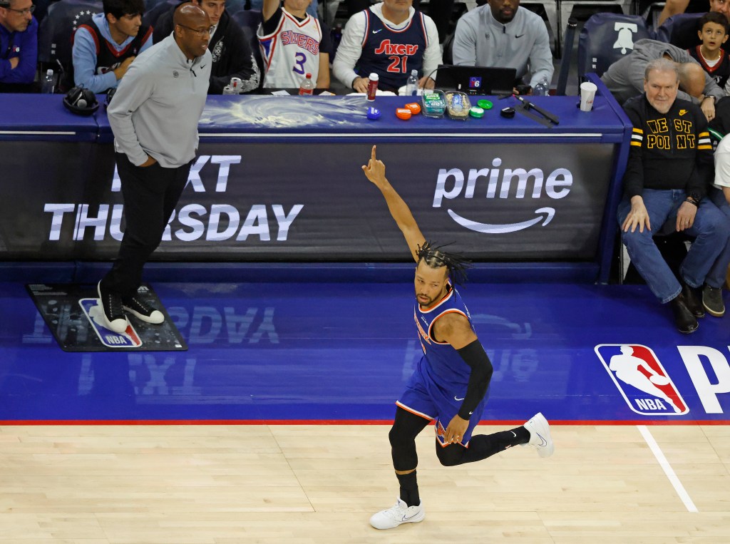 New York Knicks guard Jalen Brunson (11) reacting after scoring against the Philadelphia 76ers.
