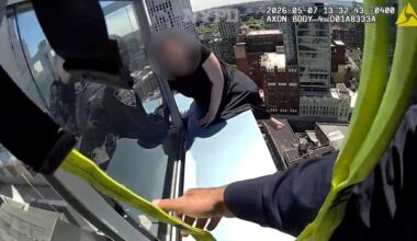 Cops save woman dangling from edge of Brooklyn skyscraper in harrowing rescue