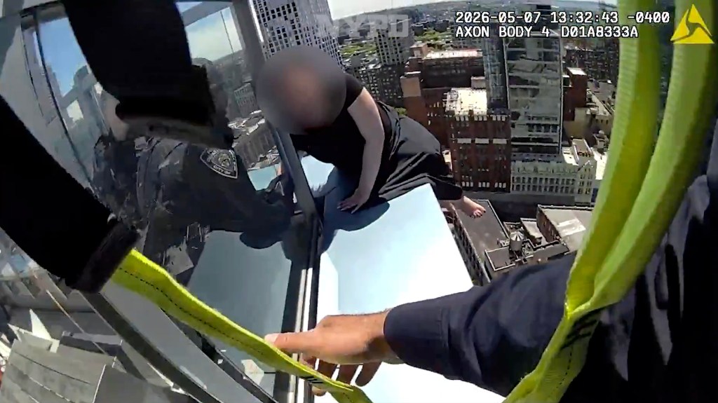 Cops save woman dangling from edge of Brooklyn skyscraper in harrowing rescue