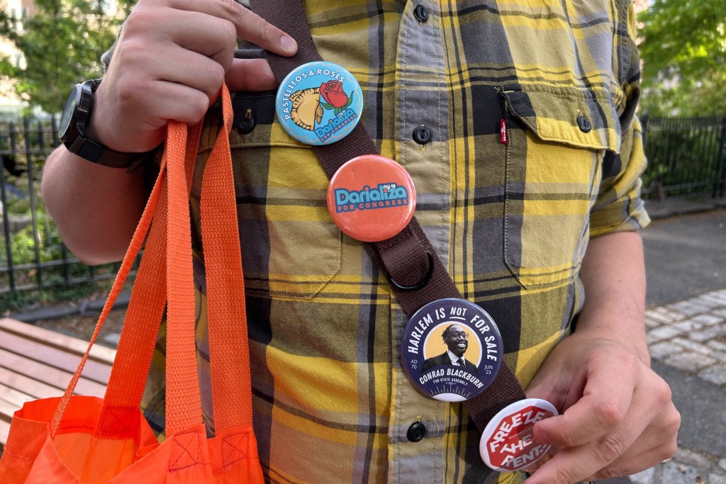 Sarah Ritzmann, left, and Ben Sadoff canvass in Washington Heights for Congressional Democratic candidate Darializa Avila Chevalier,