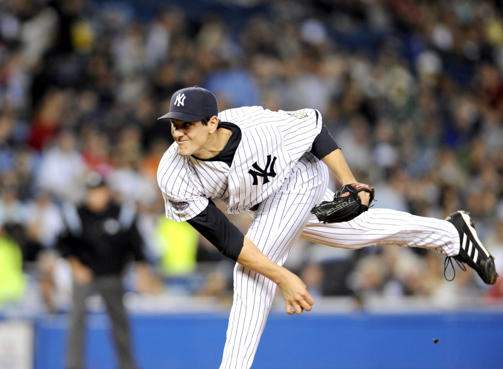 Yankees pitcher Carl Pavano pitches in the first inning.