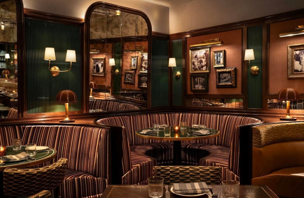 Cozy restaurant interior featuring plush seating and vintage decor. Cozy restaurant interior featuring plush seating and vintage decor.