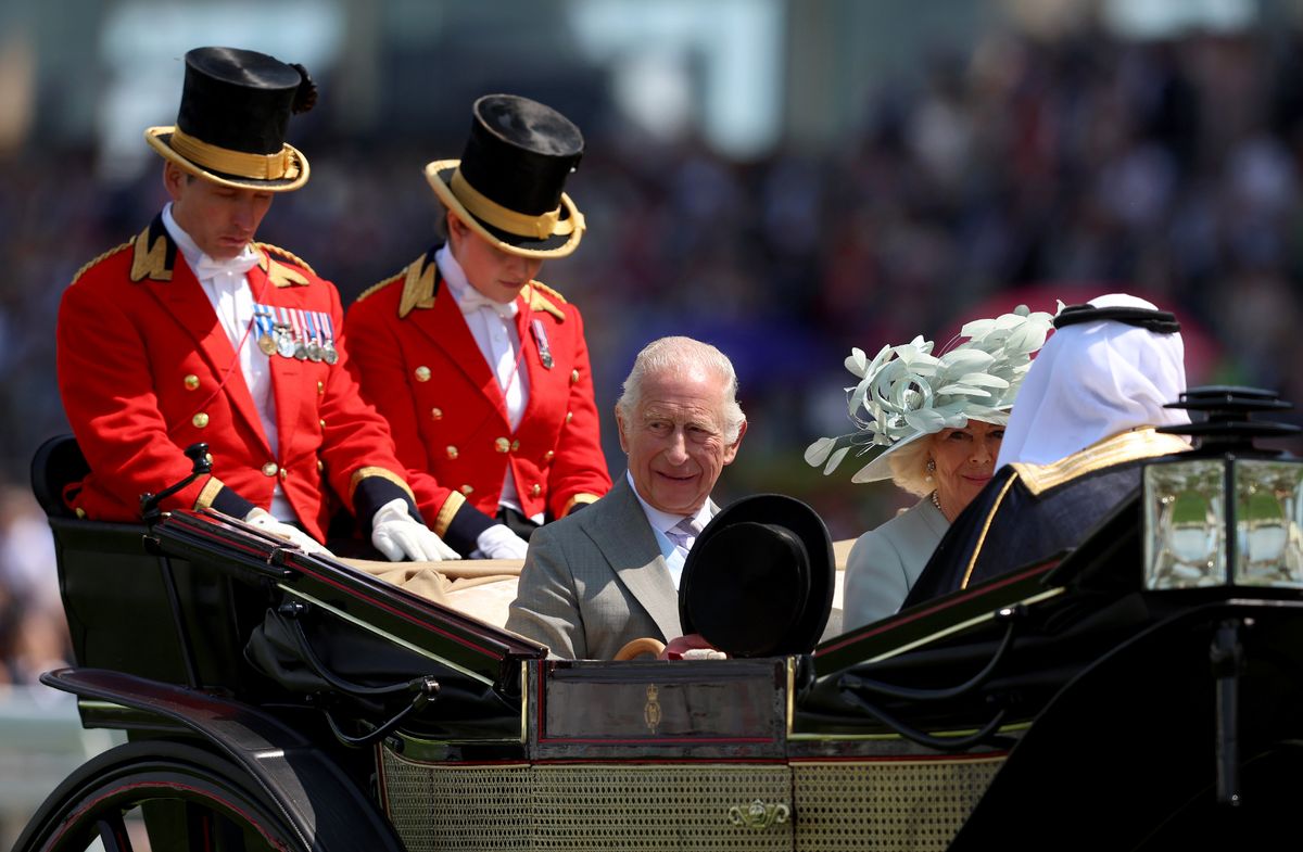 King Charles and the Queen reach the course by horse drawn carriage every day they attend